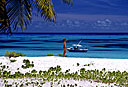 Seychelles - Océan indien - Jeune femme sur une plage tropicale par Jean-Pierre Ducatez - Toute utilisation et droit réservés par © Photothèque Ducatez